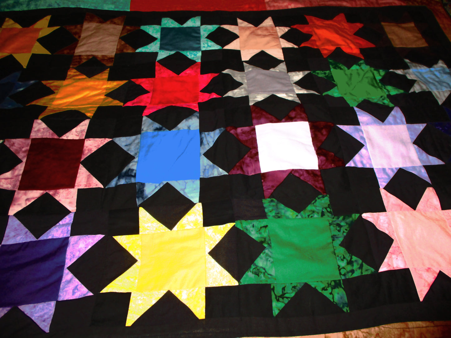 Multi-colored Star Lap Quilt
