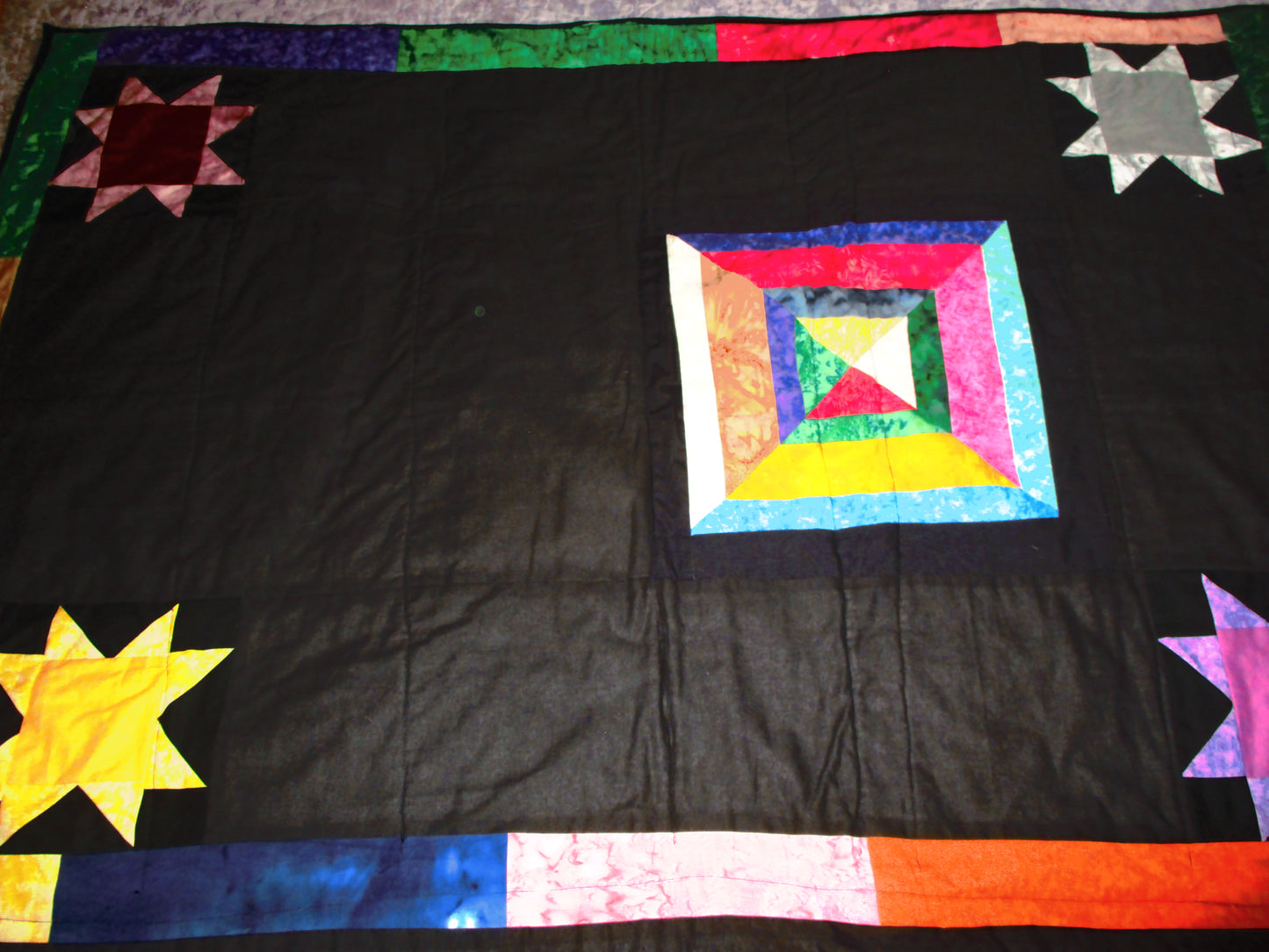 Multi-colored Star Lap Quilt